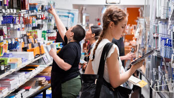 students shopping in the risd store