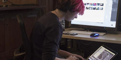 student working at a computer