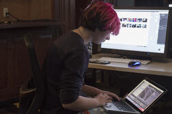 student working at a computer