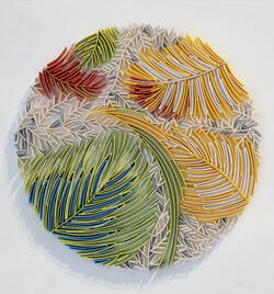 three dimensional circle with leafy patterns