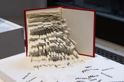 sculpture made from a book with shredded pages